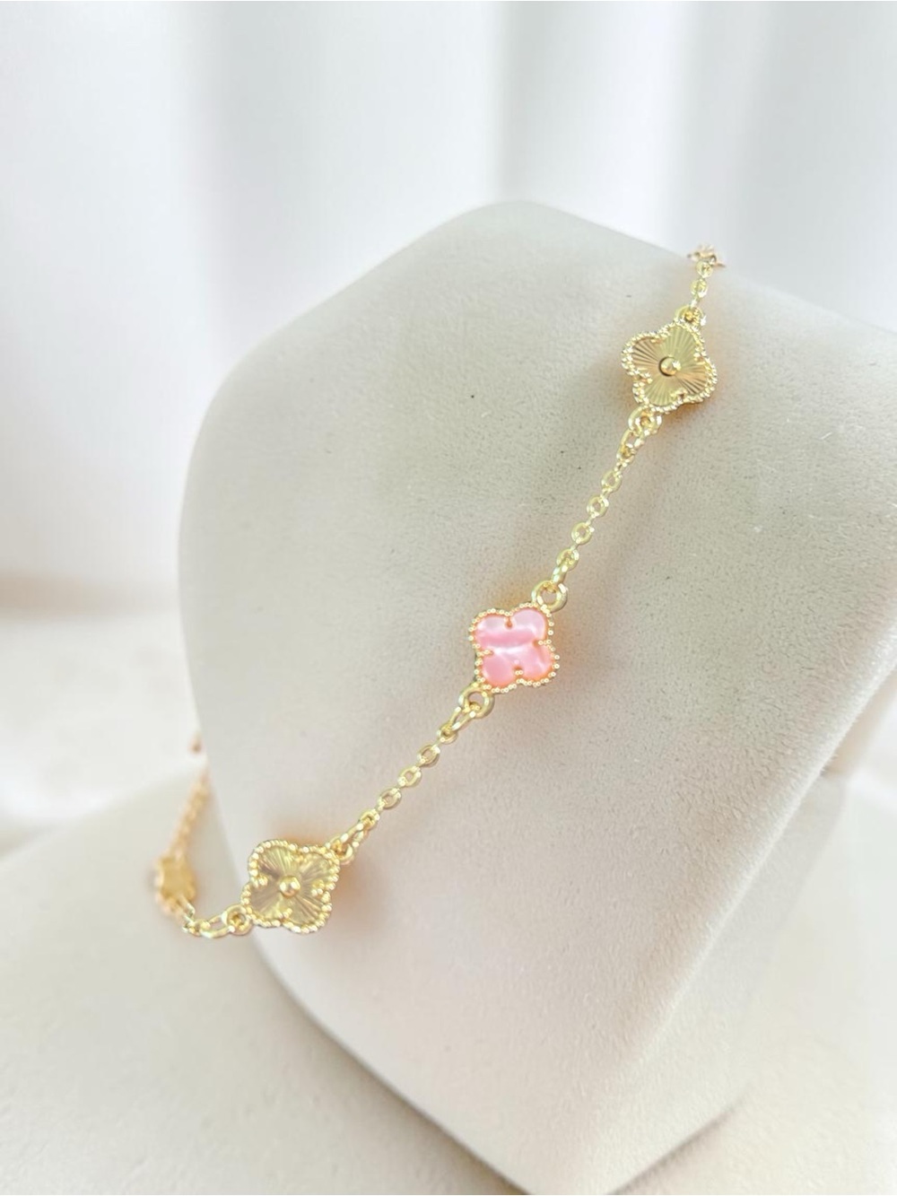 Gold Bracelet with Pink Clover Accents